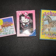 3x niedliche Mini - Puzzle u.a. Hello Kitty 24 / 48 / 54 Teile (0717)