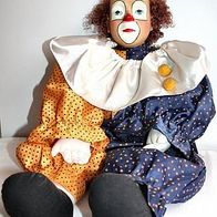 großer alter Clown zum Hinsetzen im gelb-blauen Anzug, 60 cm