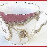 Kaffeetasse (4) - aus Porzellan mit erhabenen Mustern