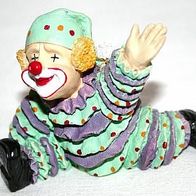 Clown im Spagat im grünlila Gewand, ca. 7 cm hoch, Dekoration