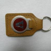 Schlüsselanhänger aus Leder mit Metallplakette mit V