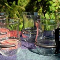 Fünf Teegläser mit abnehmbarem Kunststoffgriff