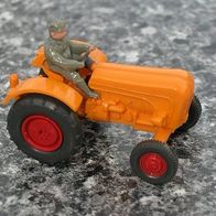 Porsche Traktor orangegelb, geschlossene Räder Wiking