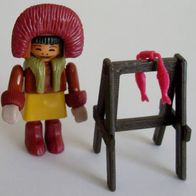 Eskimos / Frau mit Trockengestell