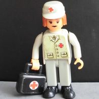 Ü-Ei Steckfigur 1990 Feuerwehr-Übung - Sanitäter mit Arztkoffer mit 3 Aufklebern
