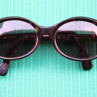 Calvin Klein, Damen-Sonnenbrille mit geschliffenen Kunststoff-Gläsern