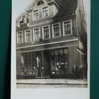 Eisleben: Geschäft Otto Busch / Fritz Eder (Markt 40), Foto-Ak um 1925