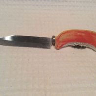 Originelles Küchenmesser mit einem Griff als Apfelviertel