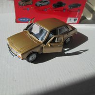 Welly Peugeot 504 gold