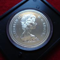 Münze Queen Elizabeth II - D. G. REGINA, rückseitig Canada Dollar Calgary 1875 - 1975