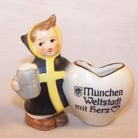 Goebel Keramik-Figur - München Weltstadt mit Herz / Münchener Kindel mit Vase