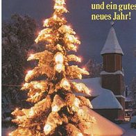 alte AK Weihnachten, leuchtender Baum mit Schnee vor der Kirche