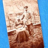 Familienfoto mit deutscher Uniform, wahrscheinlich WKI, Postkarte ca. 9x14cm