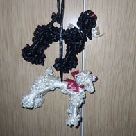 2 Hundefiguren Schwarz und weiß