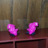 pinkfarbene Dinosaurierfiguren