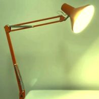 Alte Schreibtischleuchte, Twist, Modell T-1 , Metall, orange, 70er Jahre