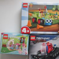 Lego Packungen Schneeraupe, Toy Story und Disney *