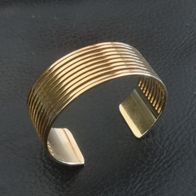 Vintage schöner breiter goldfarbener Armreif