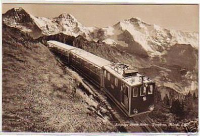 05499 Ak Schweiz Eiger, Mönch mit Jungfraubahn um 1930