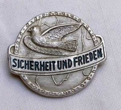 DDR Abzeichen "Sicherheit und Frieden"mit Friedenstaube