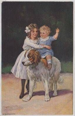 48501 Humor Ak Kind reitet auf großem Hund um 1910