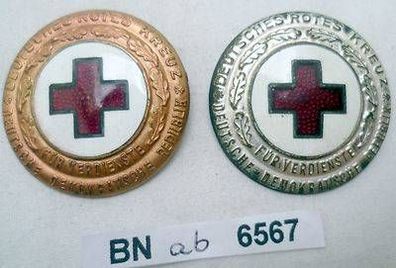 2 x DDR Ehrenzeichen des DRK in Silber und Bronze mit Nummer