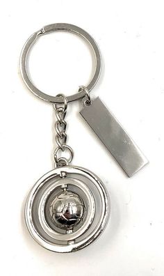 Schlüsselanhänger Ball in Kreisen schwebend Silber Metall Anhänger Charm