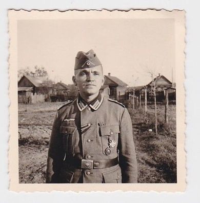 70687 Foto dt. Soldat mit EK, Winterschlacht im Osten, VWA, KVK 1. Klasse 1945