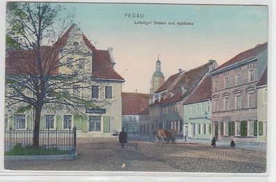 58782 Ak Pegau Leipziger Strasse und Apotheke 1901