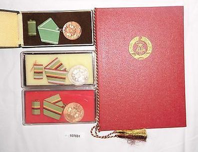 3 x DDR Medaillen MdI für hervorragende Verdienste usw. plus eine Urkunde