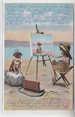 63255 Humor Ak Kind am Strand malt Hund in Kostüm 1903