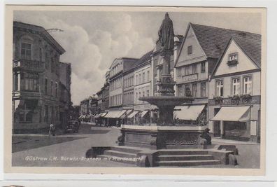 69866 Ak Güstrow in Mecklenburg Borwin Brunnen mit Pferdemarkt 1942