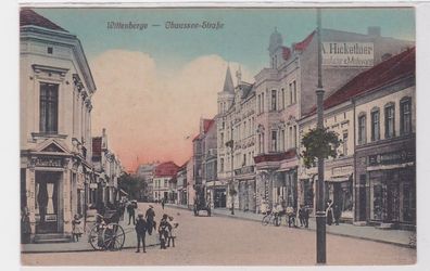 41743 Ak Wittenberge Chaussee Strasse mit Geschäften um 1920