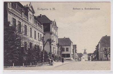 82380 Ak Kröpelin in Mecklenburg Rathaus und Rostockerstrasse 1909