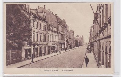 07694 Ak Riesa an der Elbe Hauptstraße mit Geschäften um 1930