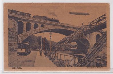 76875 Ak Elberfeld 3 Bahnen und Zeppelin an der Sonnborner Brücke 1919