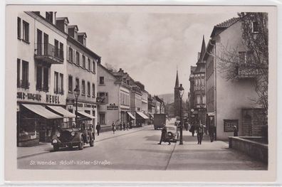 62787 Ak St. Wendel Straßenansicht mit Geschäften und Verkehr um 1935