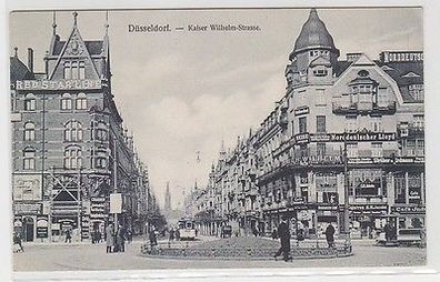 64100 Ak Düsseldorf Kaiser-Wilhelm-Strasse mit Geschäften um 1920