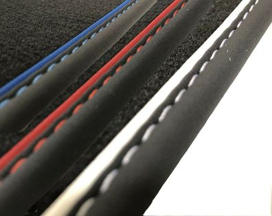 Fußmatten für Tesla 3 in Velours schwarz mit Nubukband und farbigem Unterband
