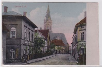 89281 Präge Ak Lucka S.-A. Strassenansicht mit Kirche 1913
