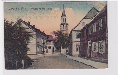 90920 AK Coswig in Anhalt - Breiterweg mit Kirche 1935