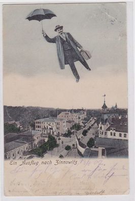 90941 Ak Ein Ausflug nach Zinnowitz Mann fliegt mit Regenschirm 1907