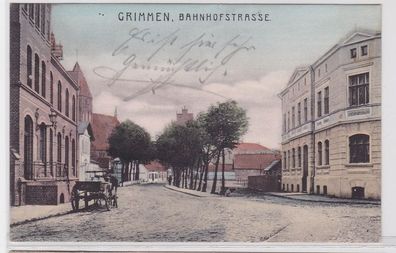 91233 Ak Grimmen in Mecklenburg Bahnhofstrasse mit Fuhrwerk 1903