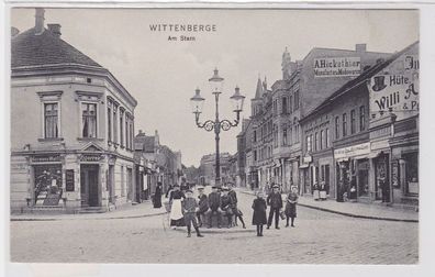 93338 Ak Wittenberge an der Elbe am Stern mit Geschäften um 1910