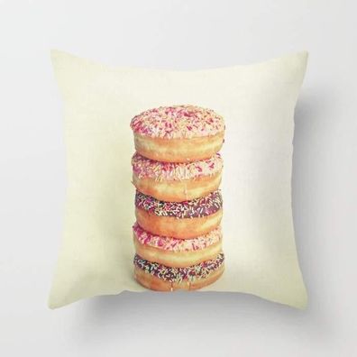 Stapel Donuts bedruckter Kissenbezug