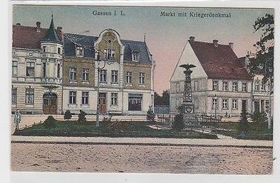 66242 Ak Gassen i.L. Markt mit Kriegerdenkmal 1920