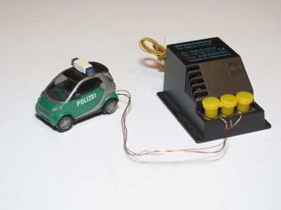 Busch 5624 - Smart Mercedes mit Blinkschaltung - Polizei - Blaulicht - HO - 1:87