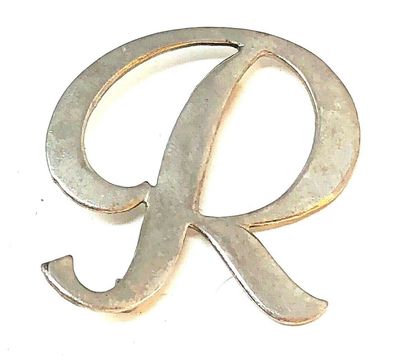 Brosche in Form eines silberfarbenem "R" ca. 3,9 x 3,7 cm groß (K)