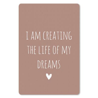 Mauspad - Englisches Zitat "I am creating the life of my dreams" auf braunem Hintergr