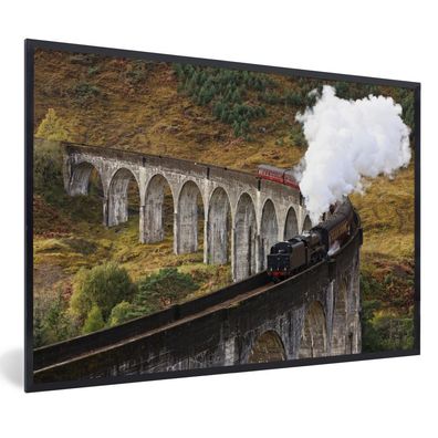 Poster - 60x40 cm - Eine Dampflokomotive über eine charakteristische Brücke
